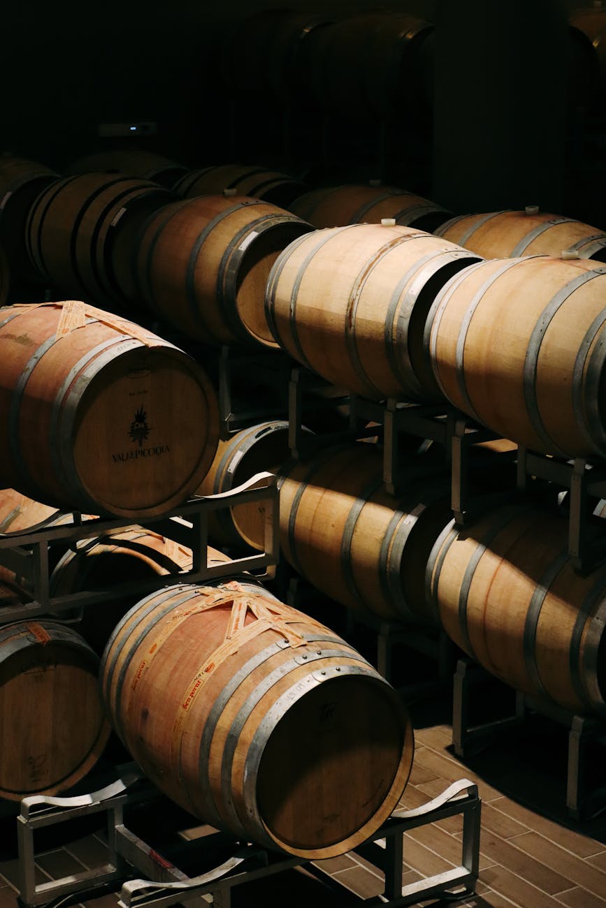 Traditional oak barrels in the winery